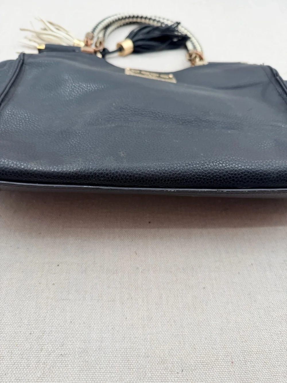 bebe Black Satchel with Braided Two-Tone Handles and Tassels